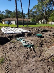 Waste and sludge removal as part of Orlando septic tank service to ensure functionality and longevity of system.